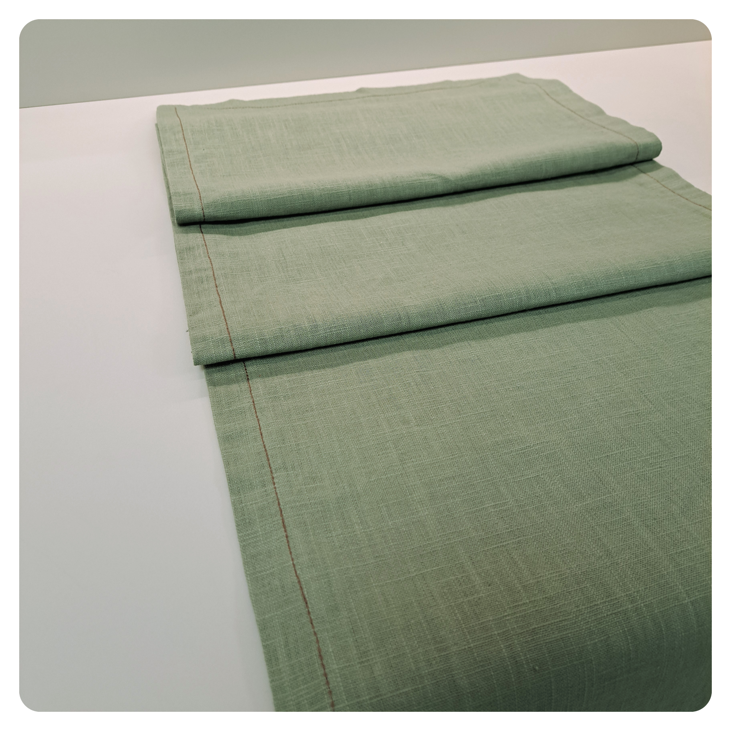 Sage green folded table runner